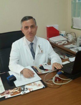 Dr. NEDİM KOMAR